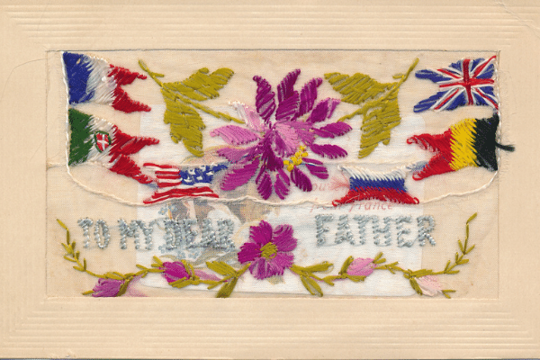 SIlk embroidered postcard from WWI with flags and message "To my dear father"
